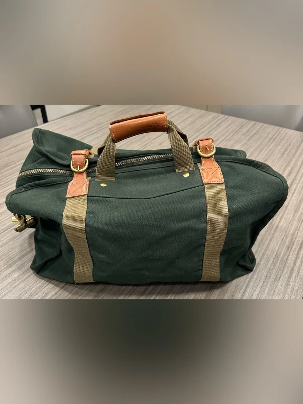 Tumi Dakota Dark Green Canvas Duffel with Tan Straps and Brown Leather Trim